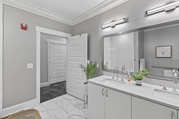 Bathroom with vanity and mirror
